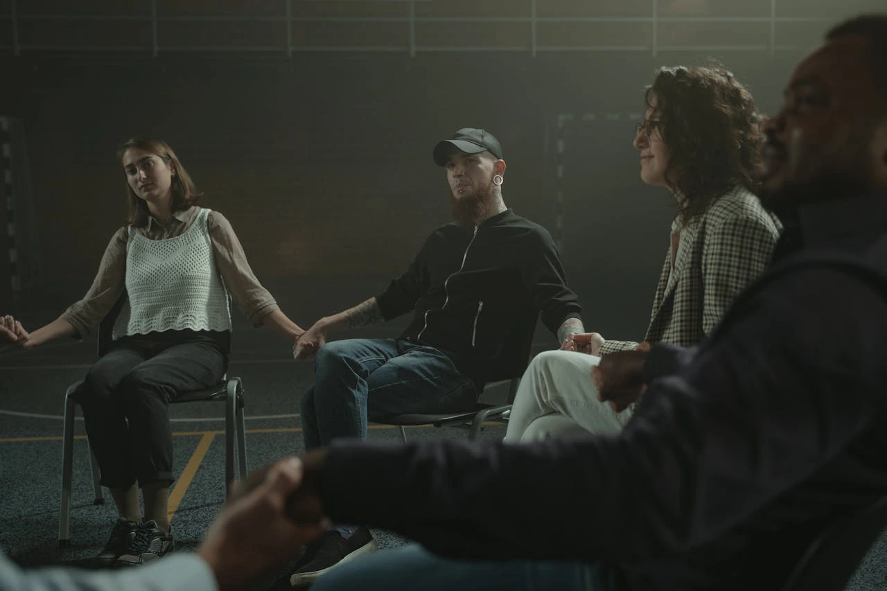 Group Therapy Holding Hands